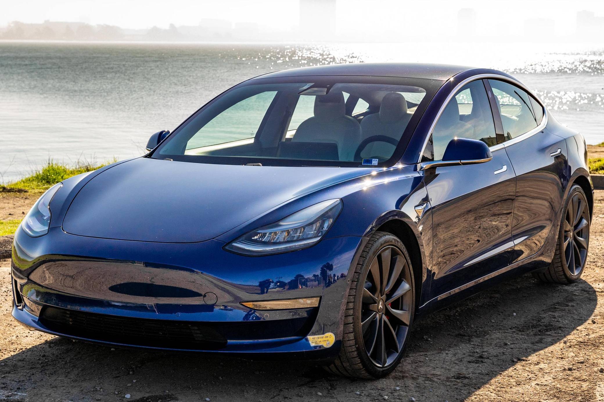 Deep blue metallic tesla deals model 3